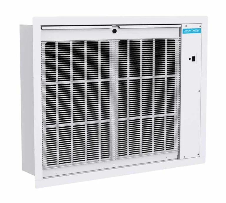A white, wall-mounted HVAC unit with a large gridded vent. 